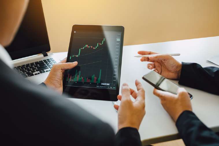 tablet with candlestick chart