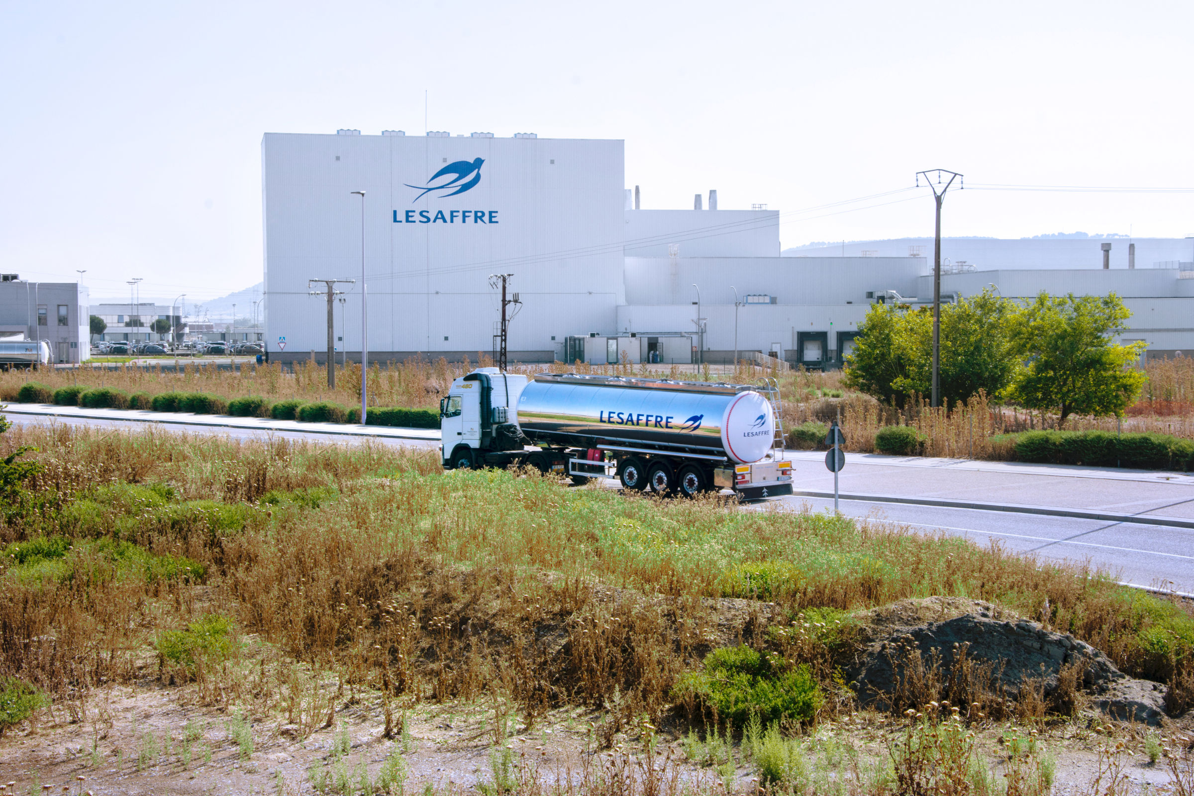 Outside factory with a truck